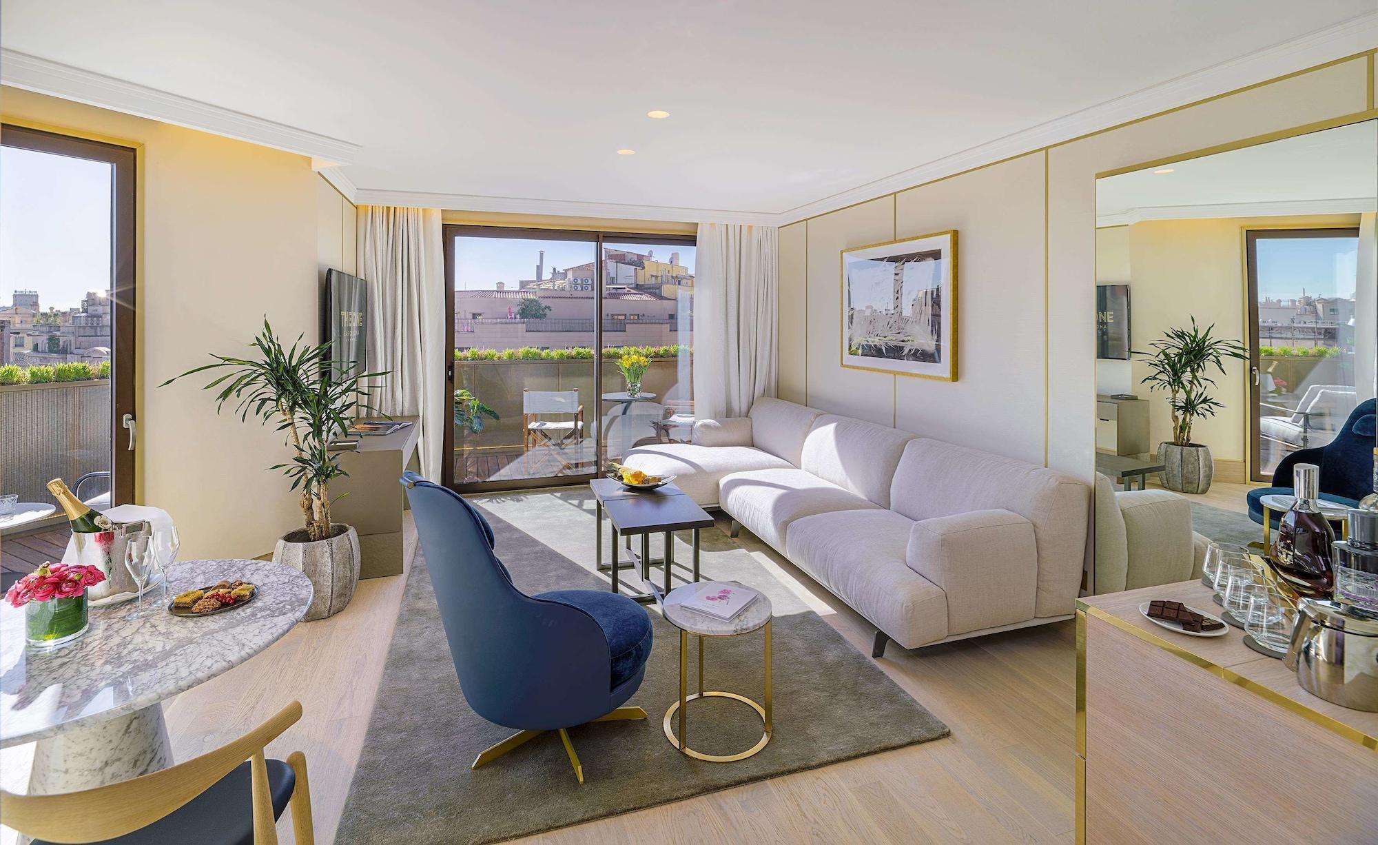 The One Barcelona Gl Hotel Exterior photo A staged living room