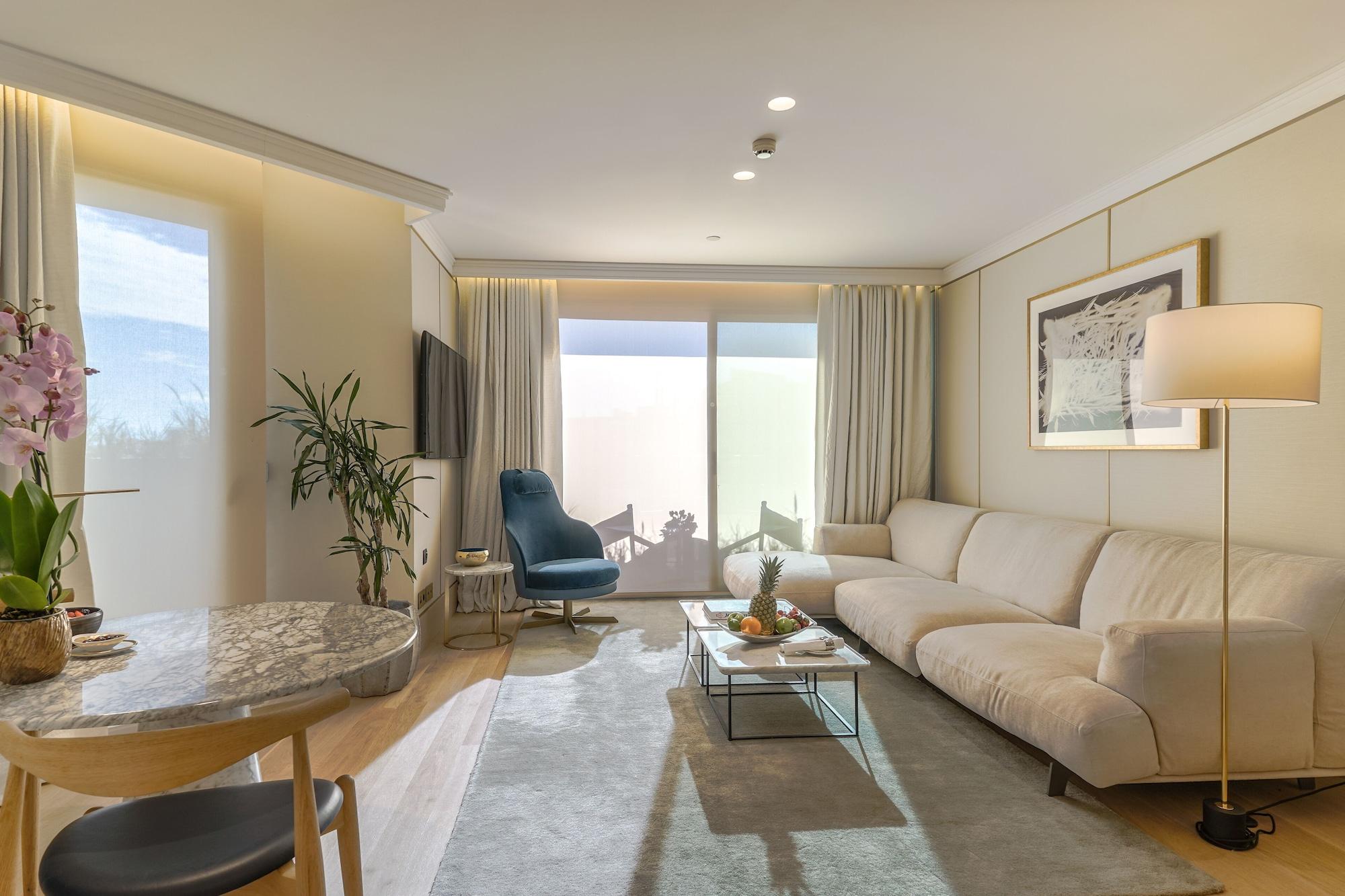 The One Barcelona Gl Hotel Exterior photo A living room in a typical apartment